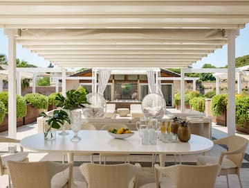 a table and chairs on a patio