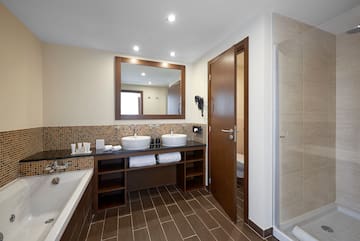 a bathroom with a sink and a bathtub