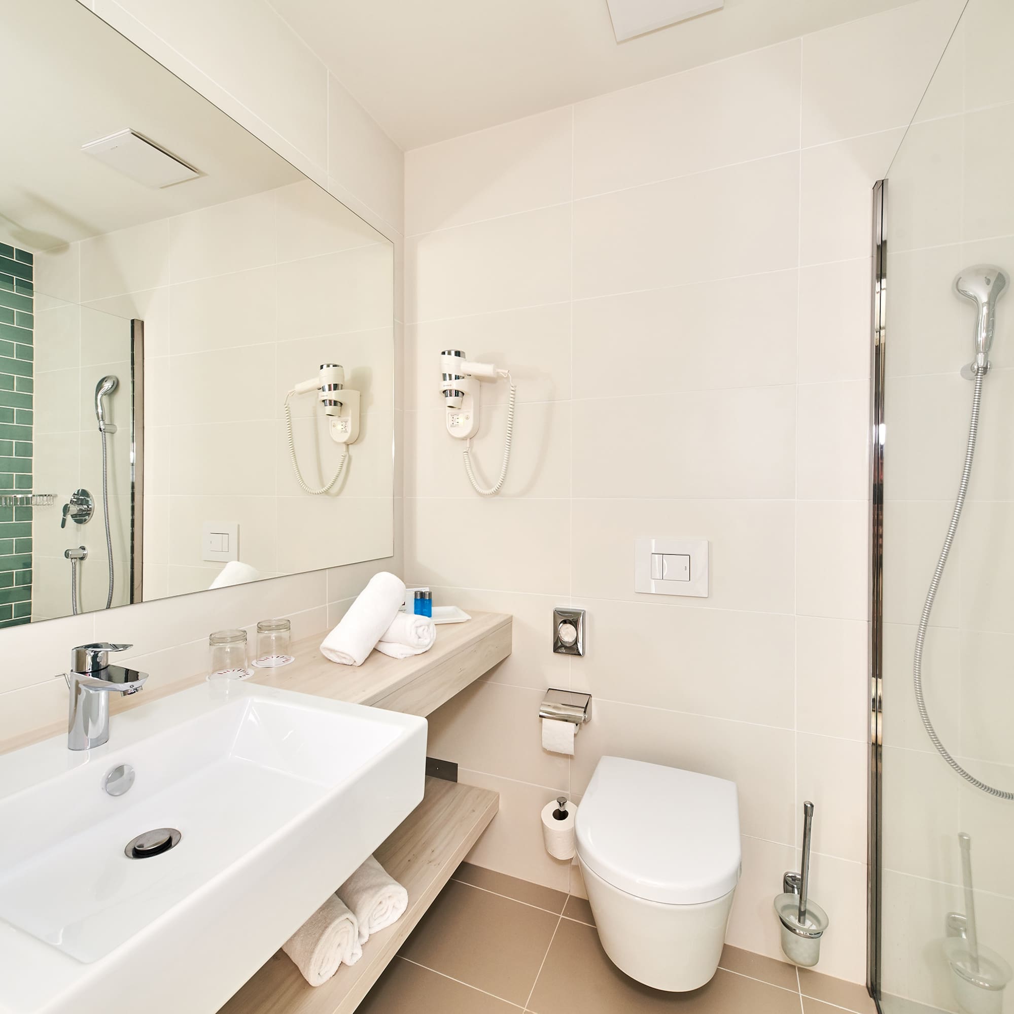 a bathroom with a sink and a shower