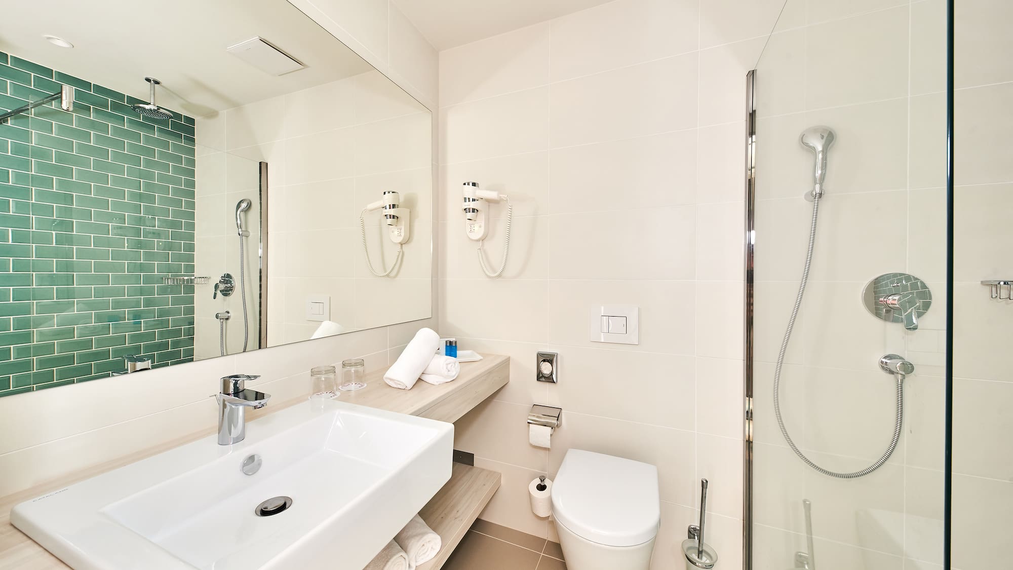 a bathroom with a sink and a shower