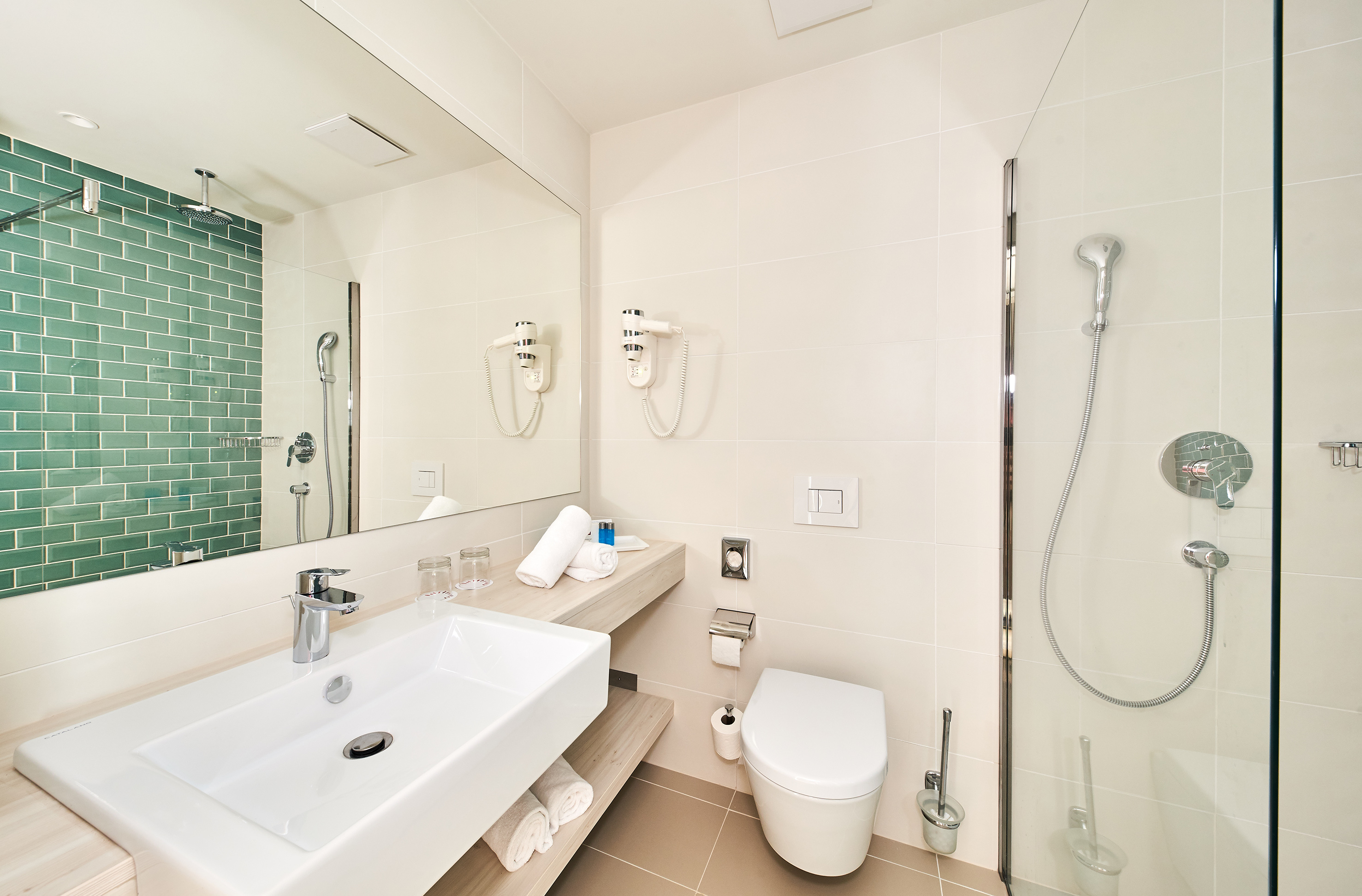 a bathroom with a sink and a shower