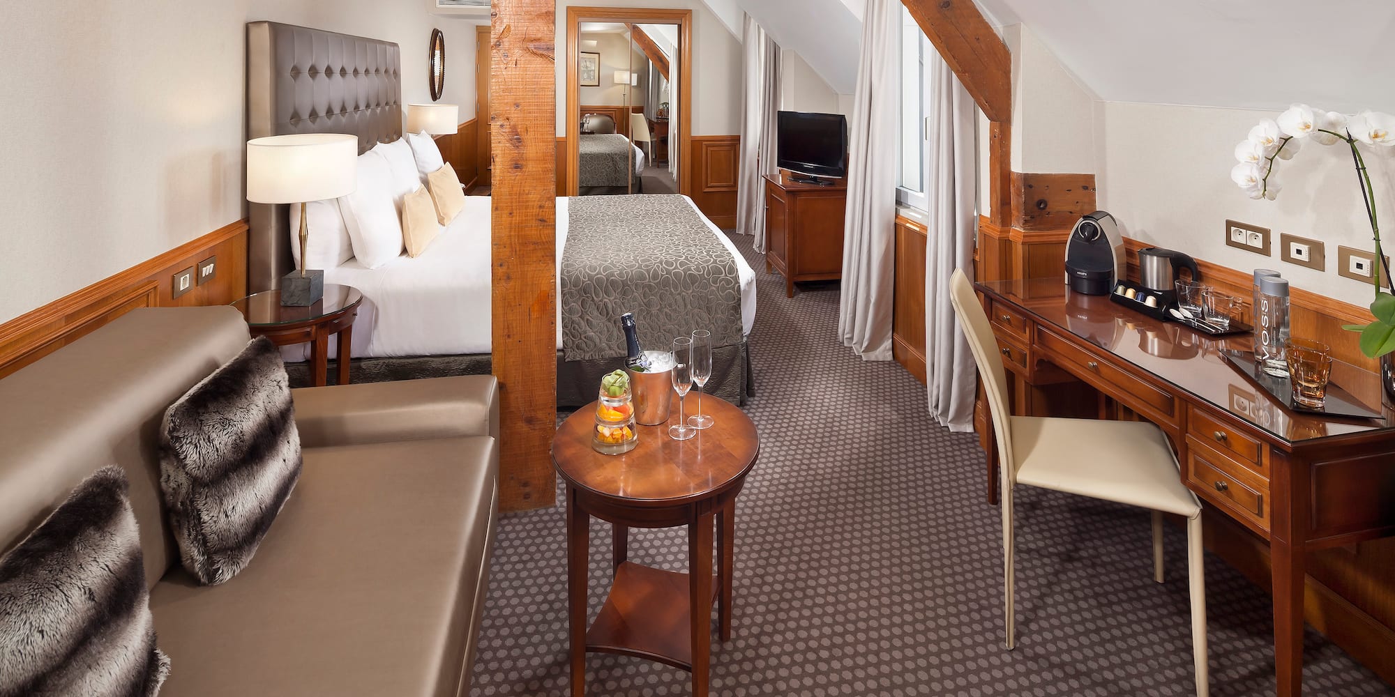 a room with a bed and a table