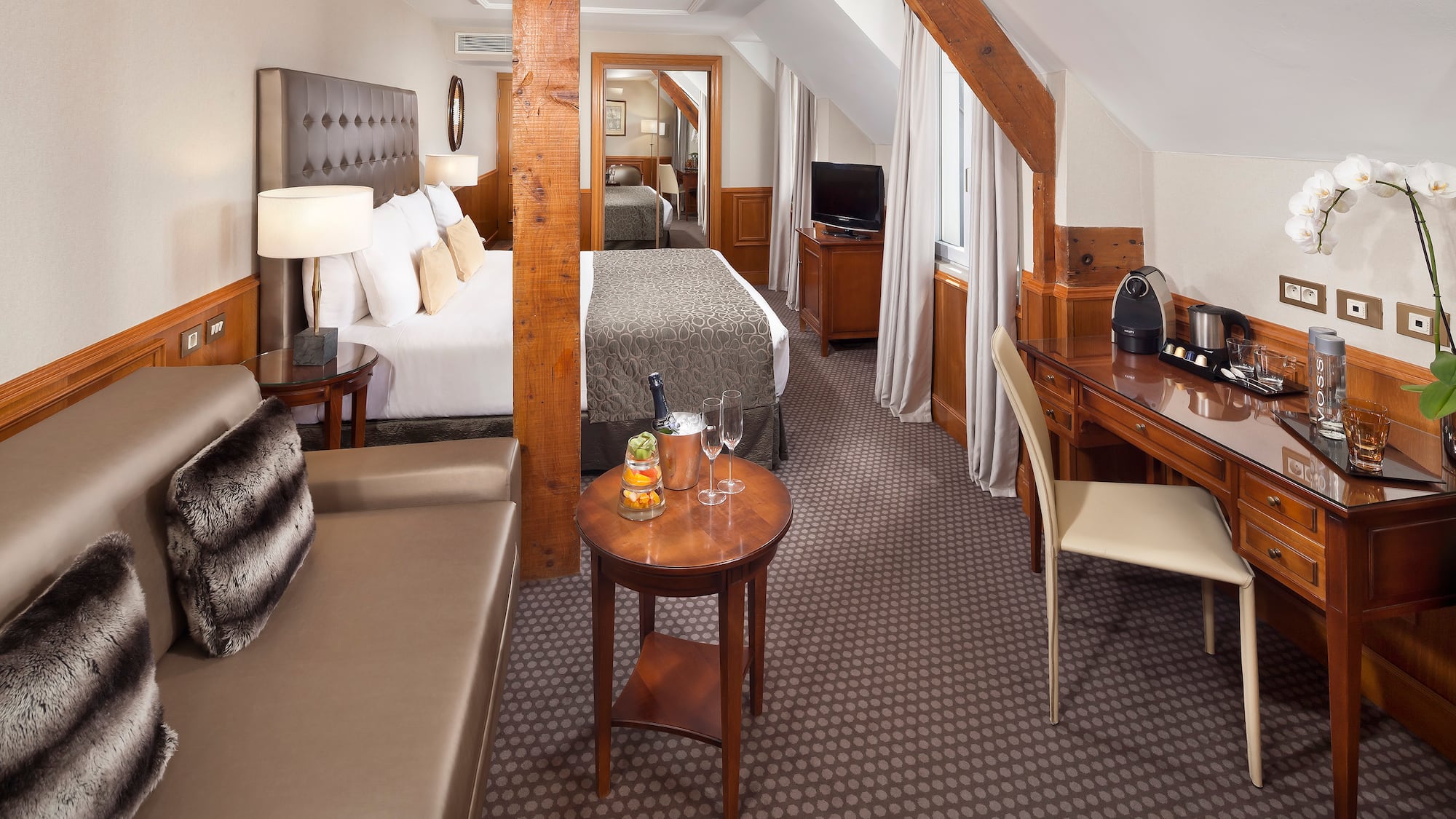 a room with a bed and a table