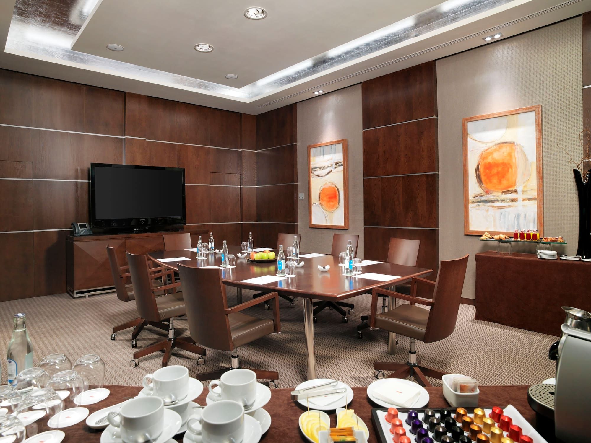 a room with a table and chairs