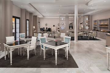 a room with tables and chairs