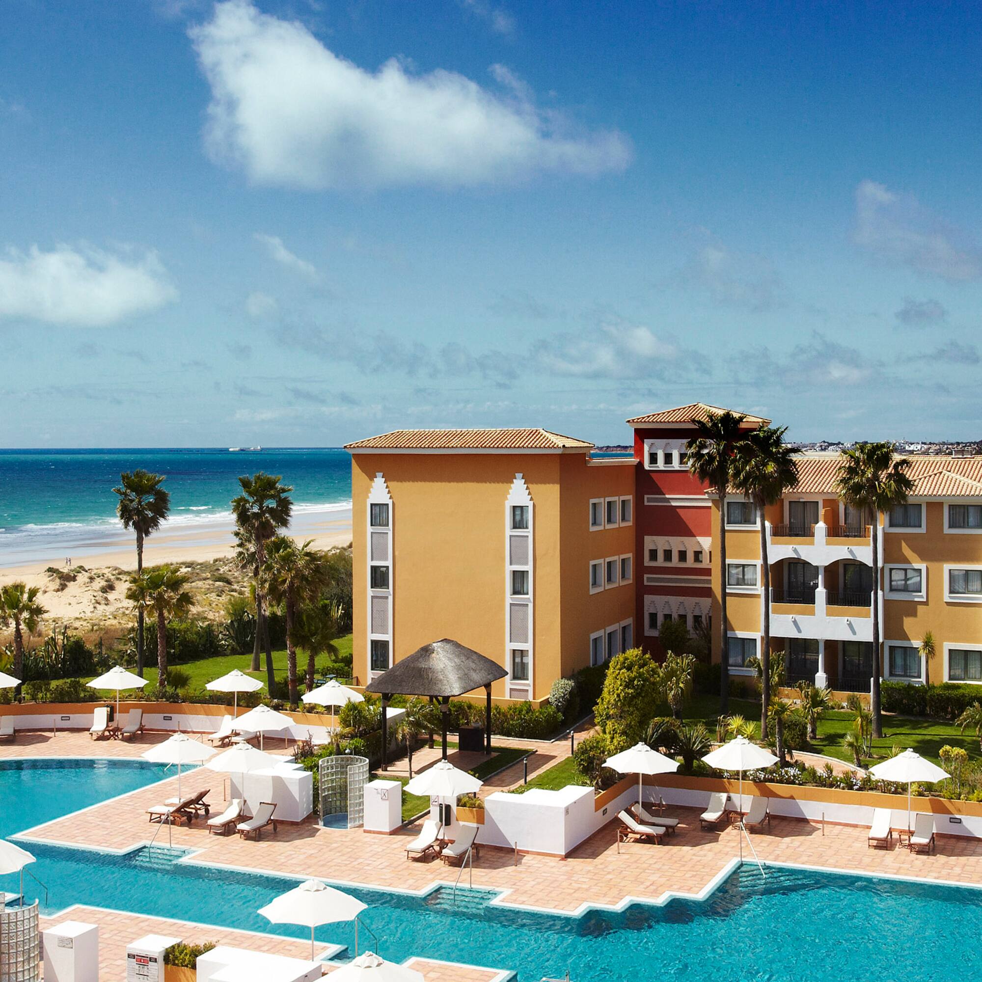 a swimming pool next to a building