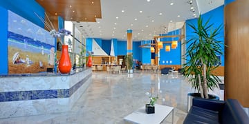 a lobby with blue walls and blue walls