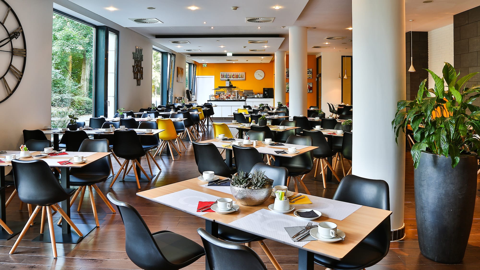 a room with tables and chairs