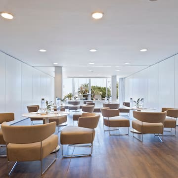 a room with tables and chairs