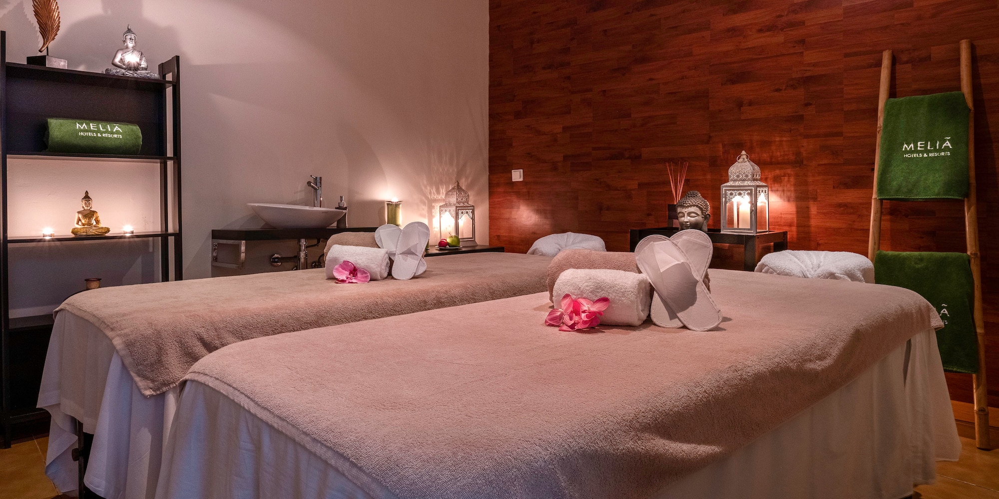 a massage room with towels and towels