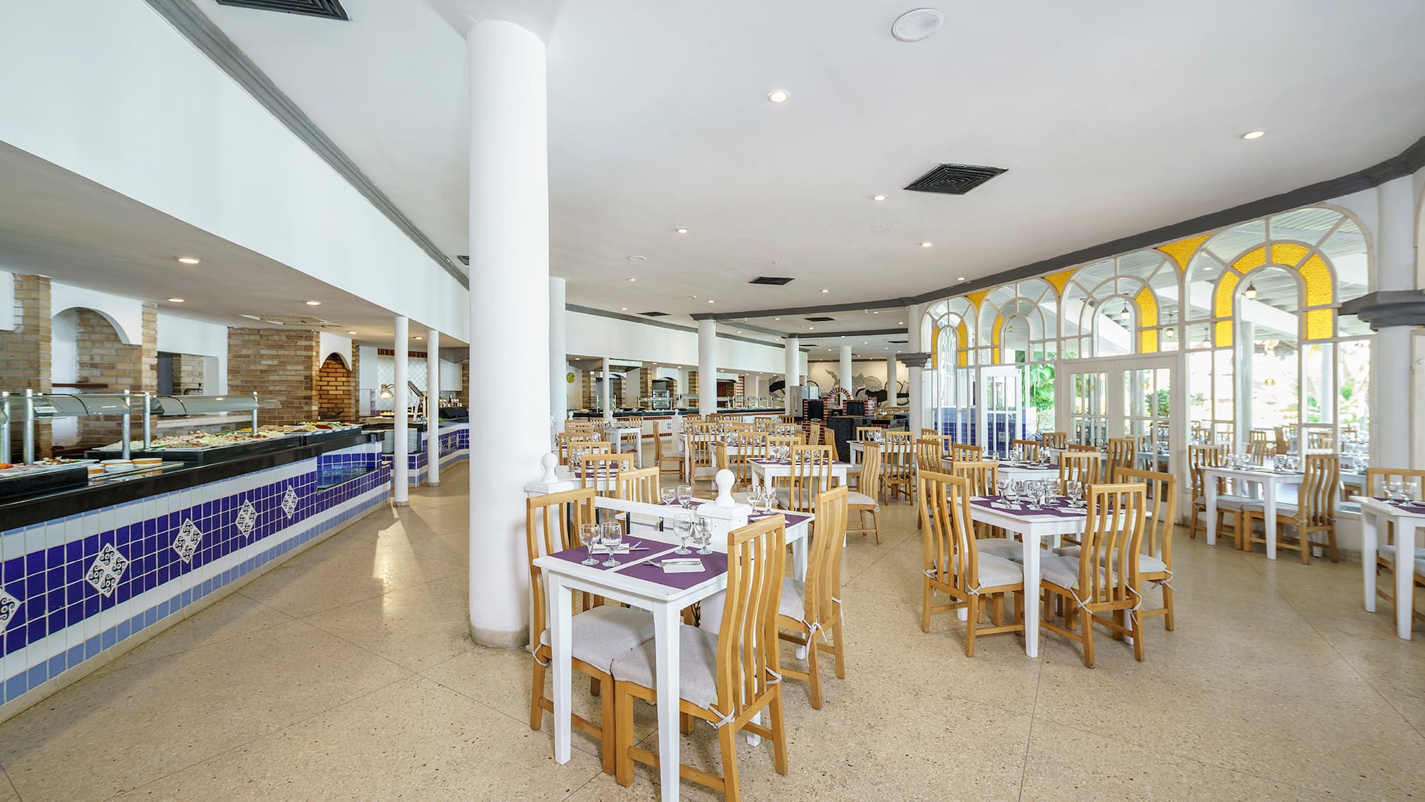 a restaurant with tables and chairs