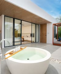 a tub outside of a house