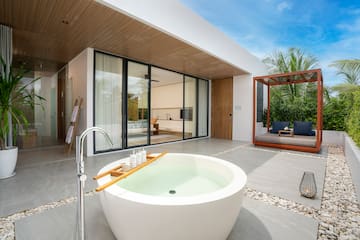 a tub outside of a house