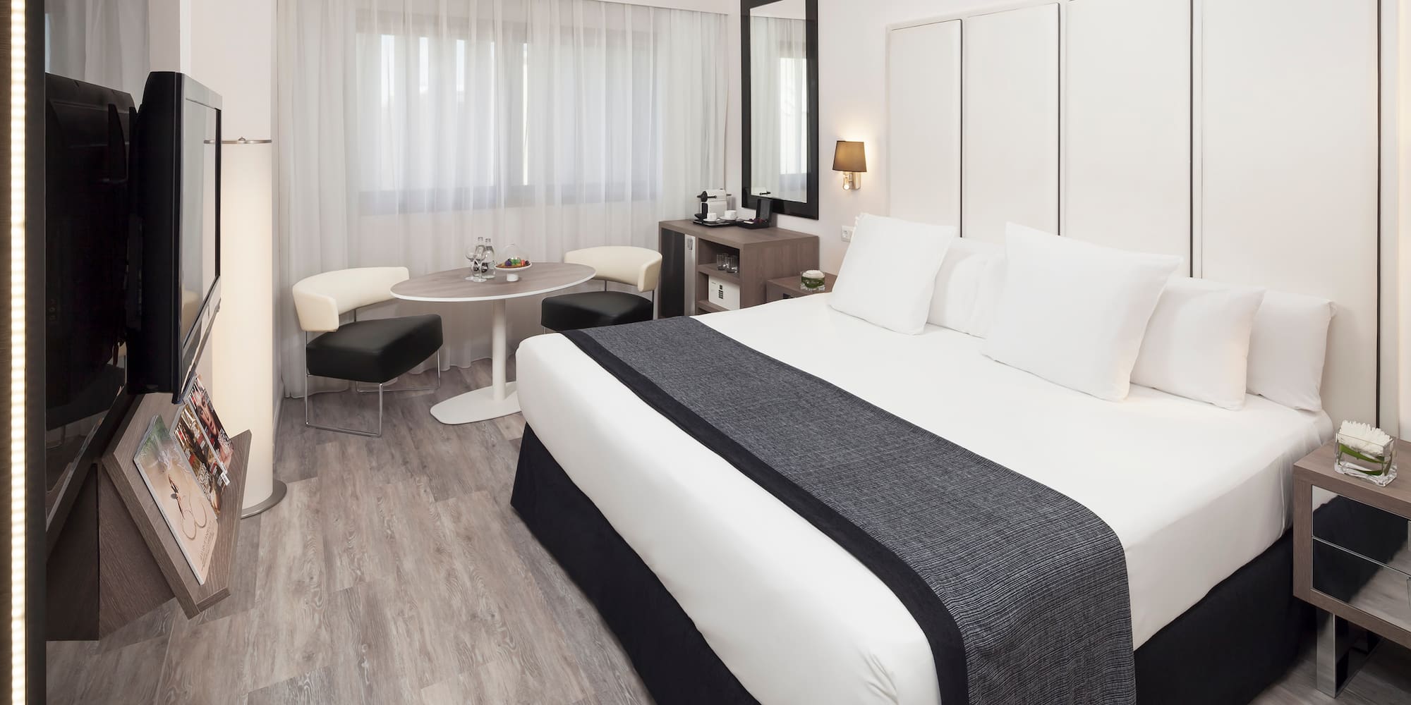 a room with a bed and a table