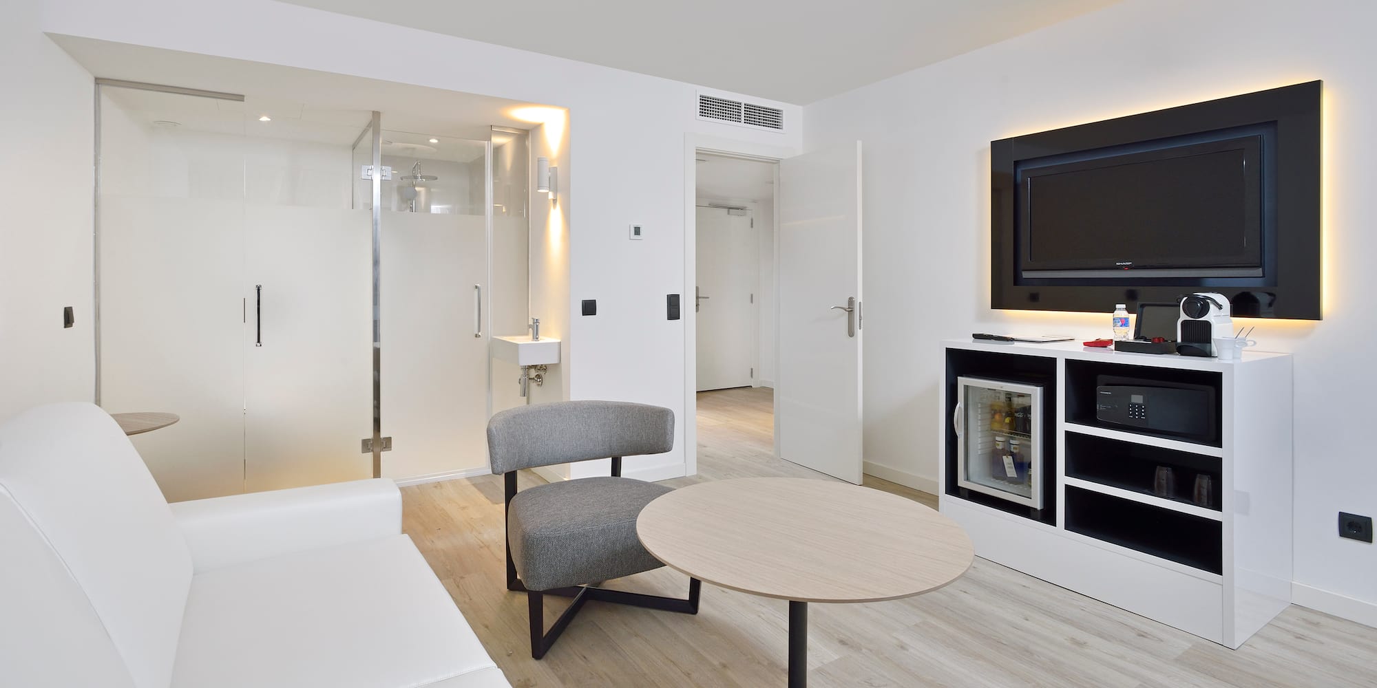 a room with a television and a couch