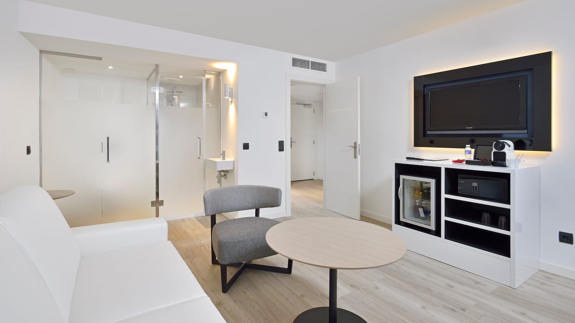 a room with a television and a couch