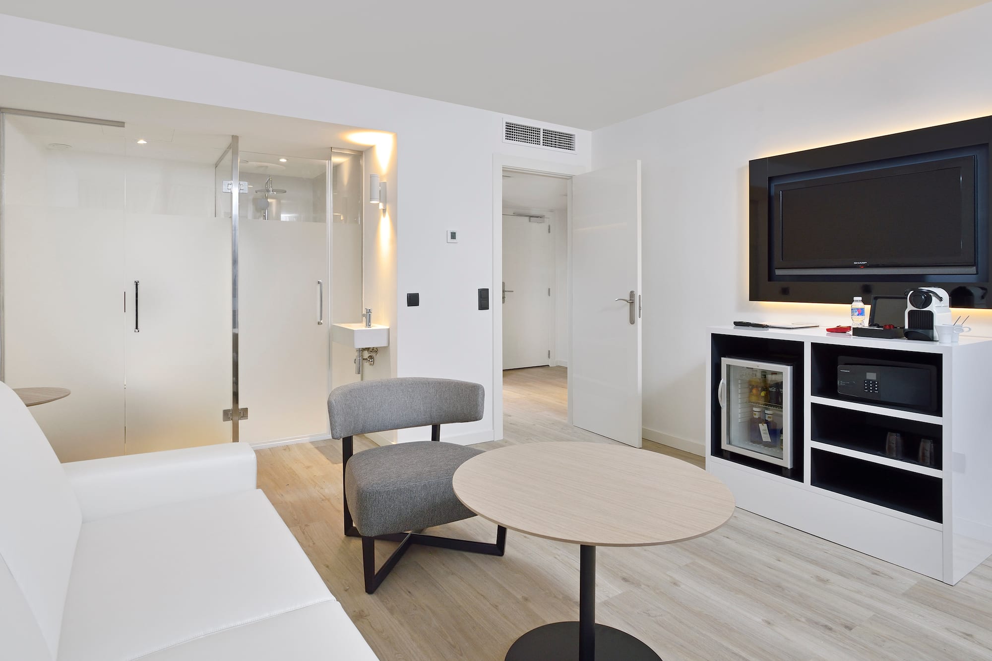 a room with a television and a couch