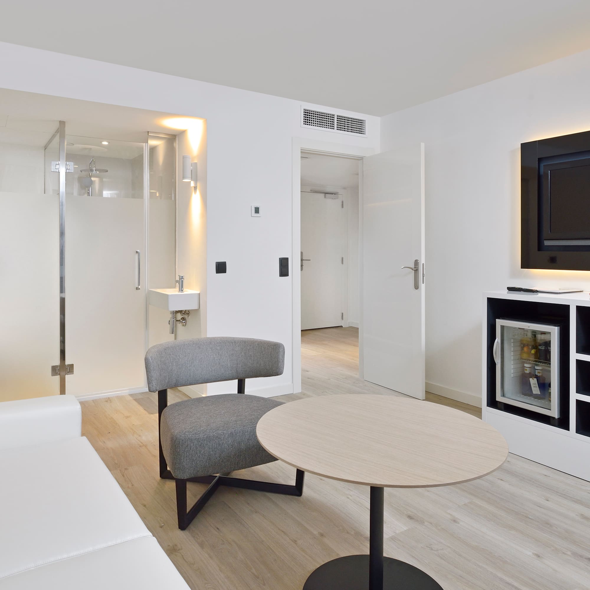 a room with a television and a couch