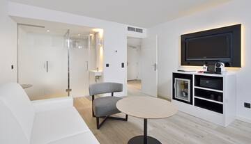 a room with a television and a couch