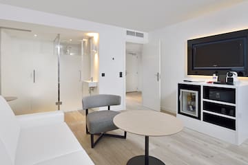 a room with a television and a couch