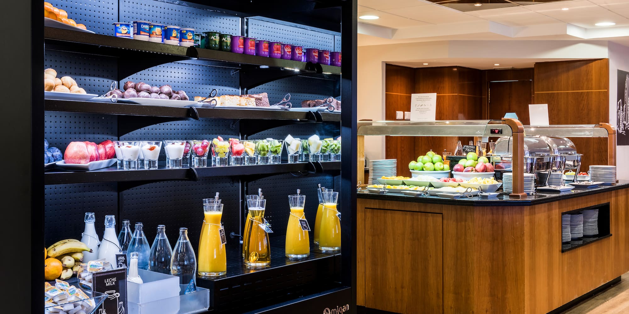 a display case with drinks and beverages on shelves