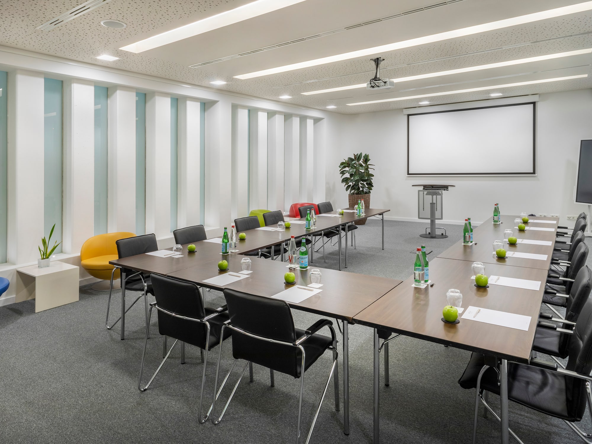 a room with tables and chairs