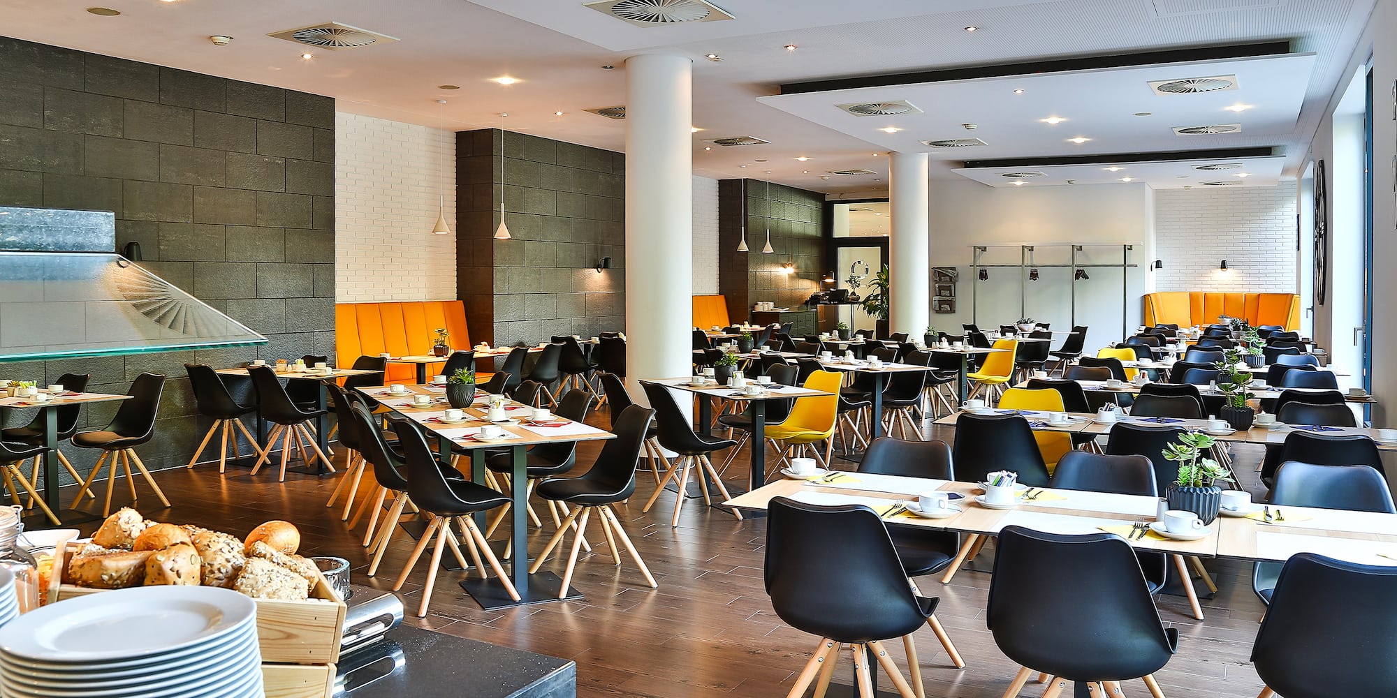 a room with tables and chairs