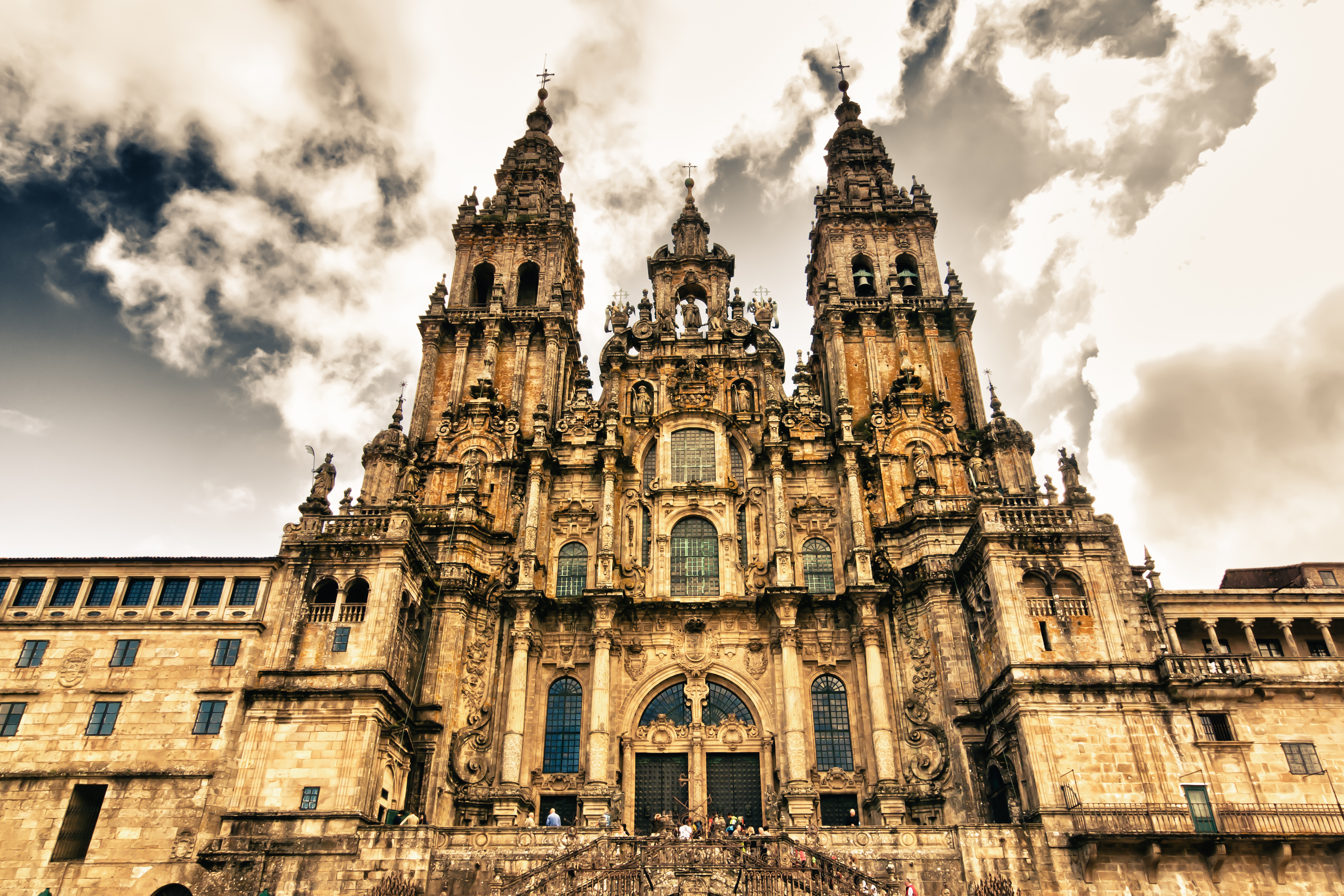 a large stone building with many towers