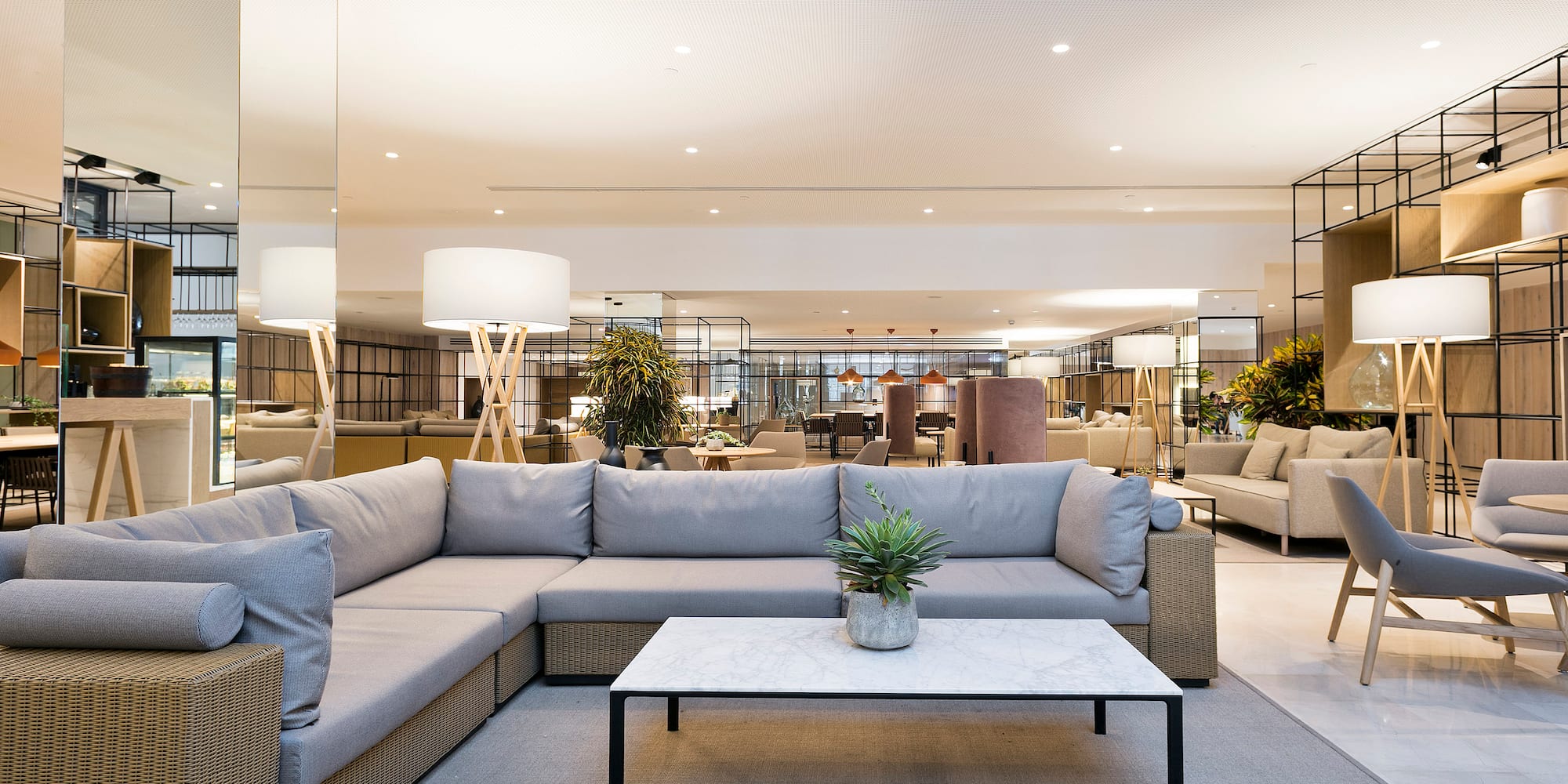 a large room with a couch and a coffee table