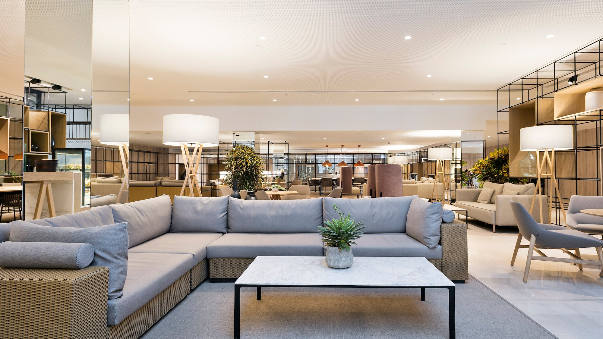 a large room with a couch and a coffee table