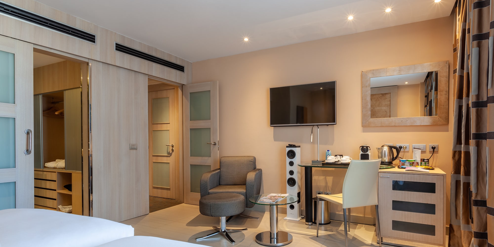 a room with a tv and a table