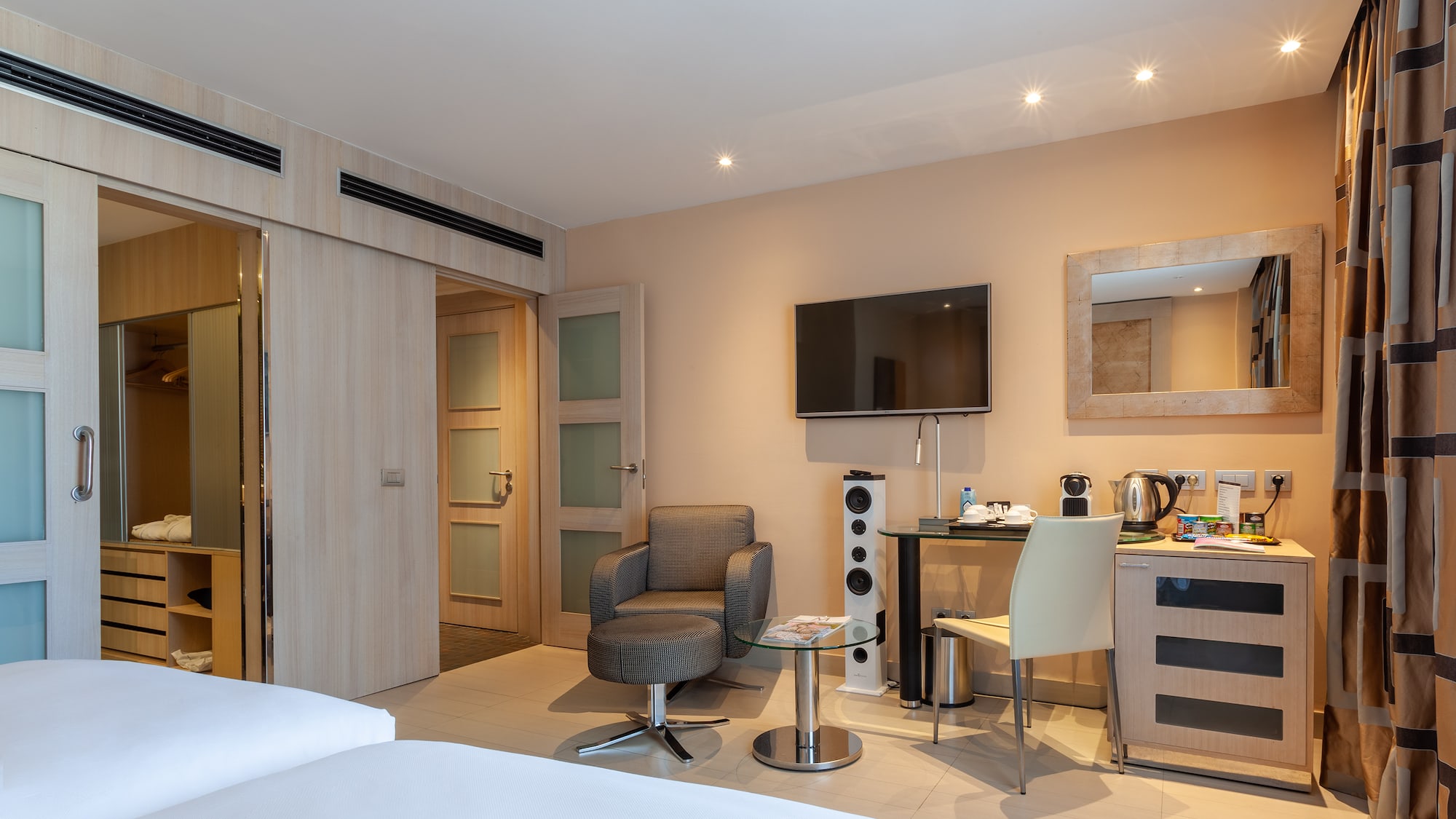 a room with a tv and a table