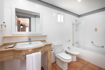 a bathroom with a sink and toilet