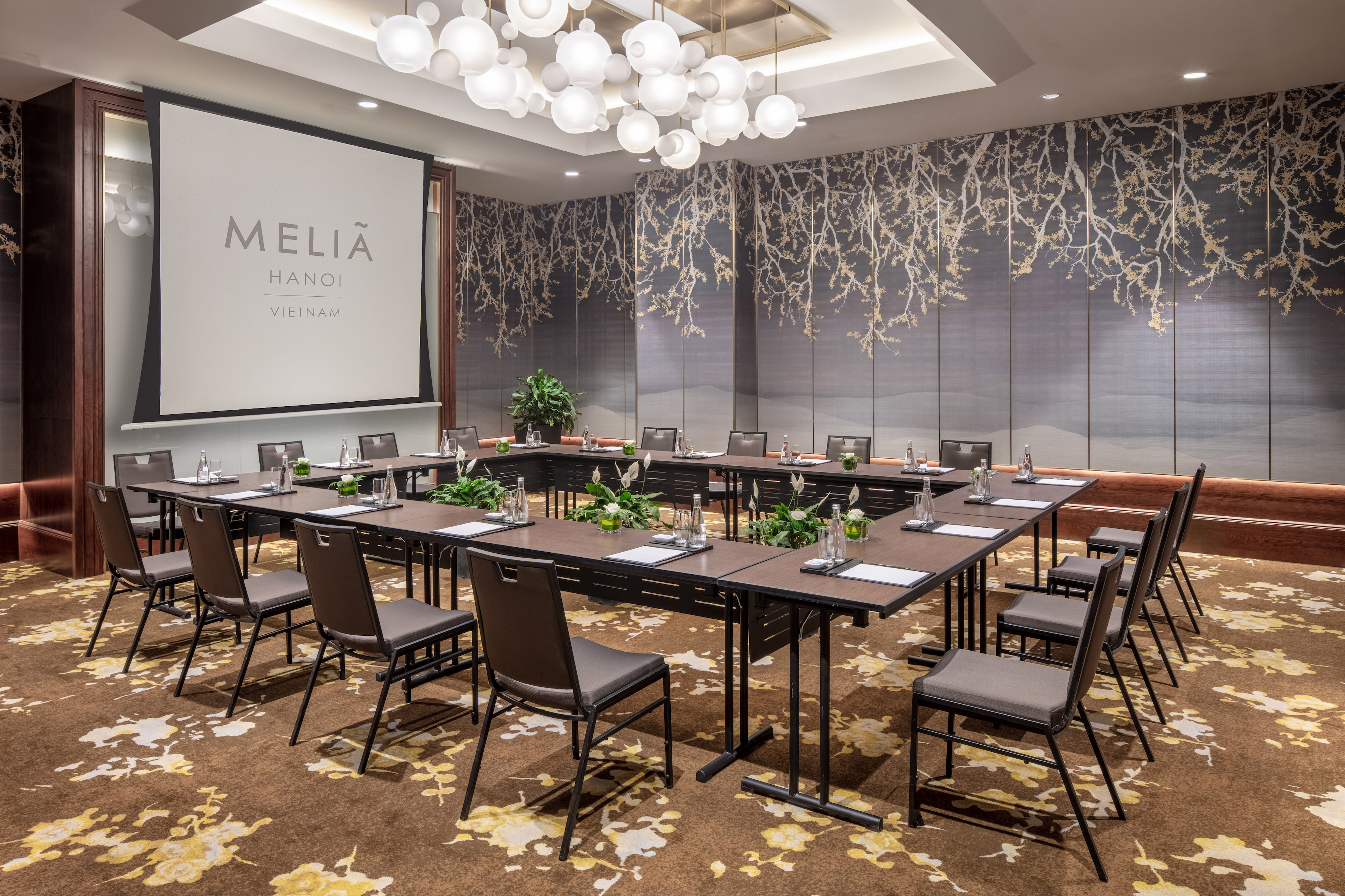 a room with tables and chairs