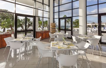 a room with tables and chairs