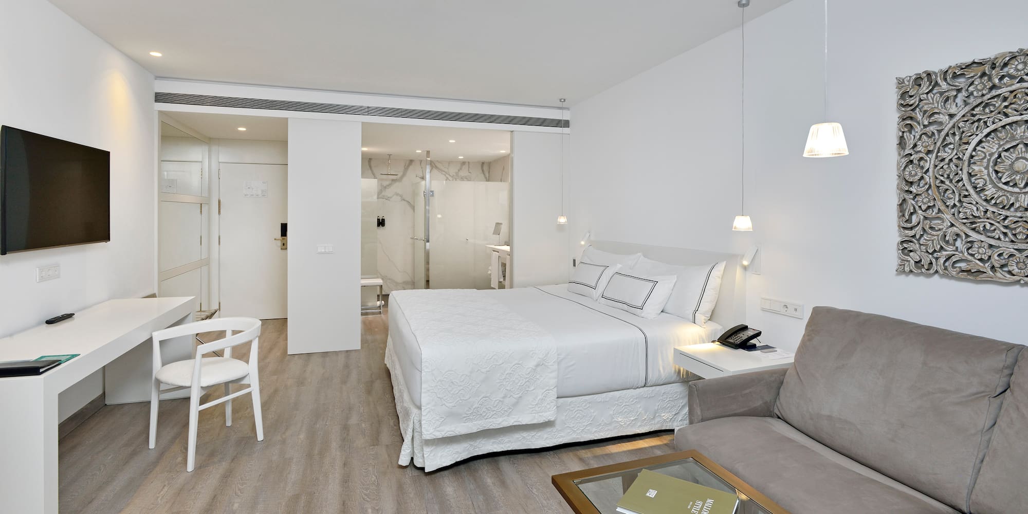 a room with a bed and a couch