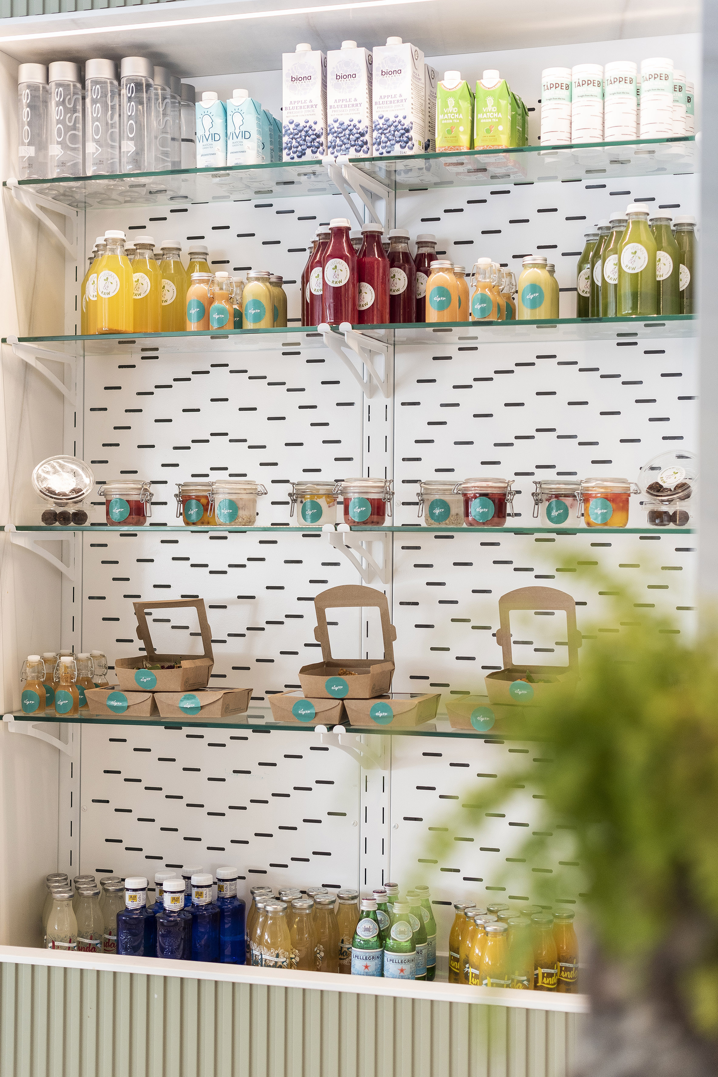 shelves with different drinks and food items