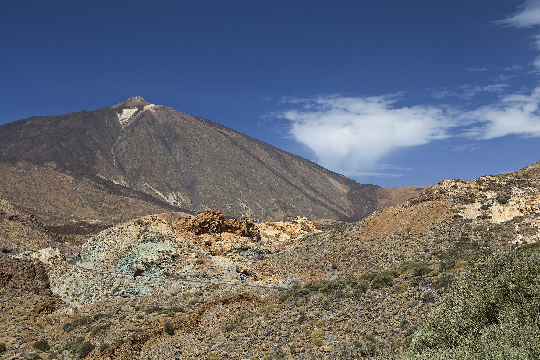 Mount Teide volcano, rocky desert landscape, winding road, Tenerife.