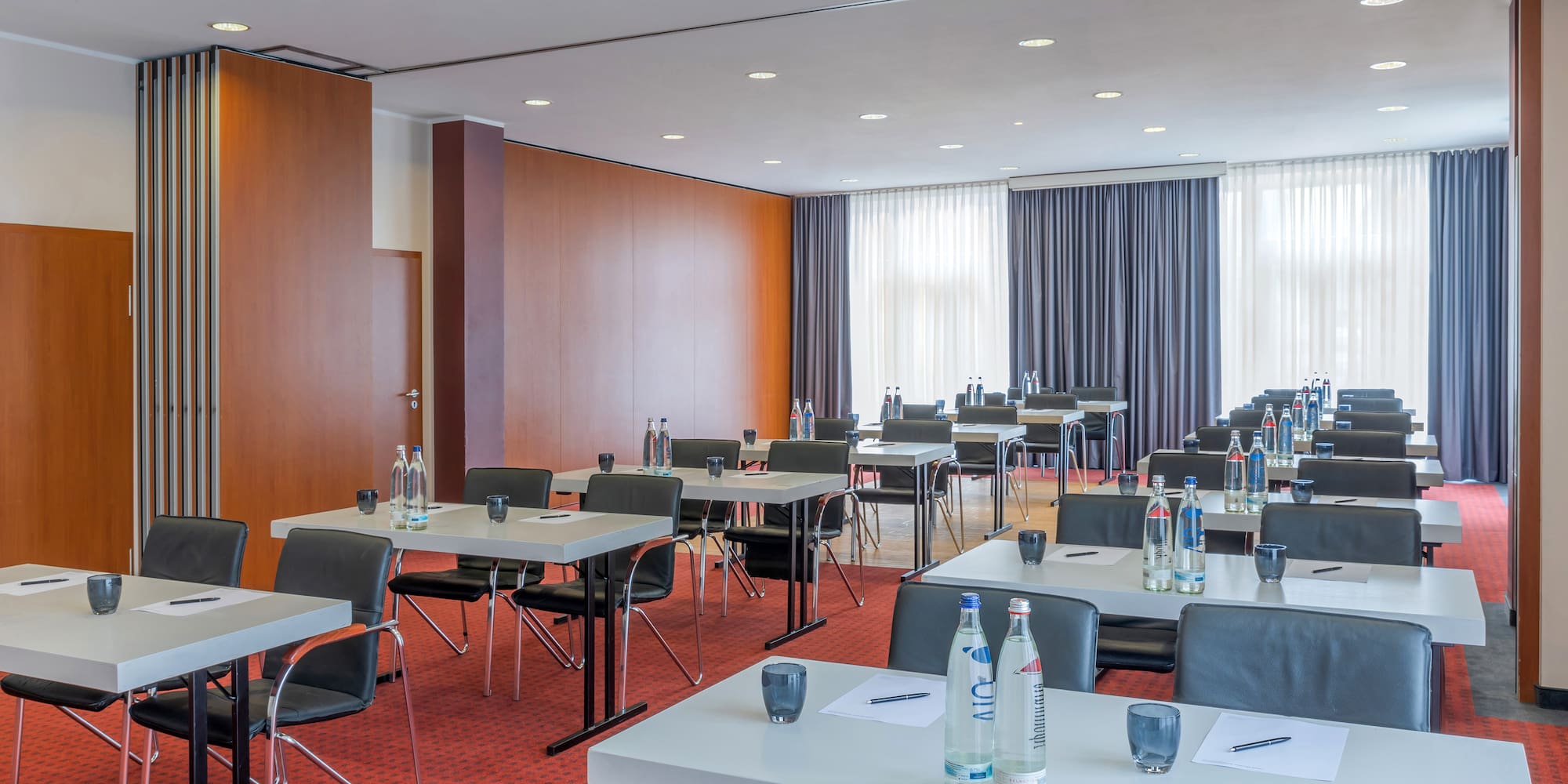 a room with tables and chairs