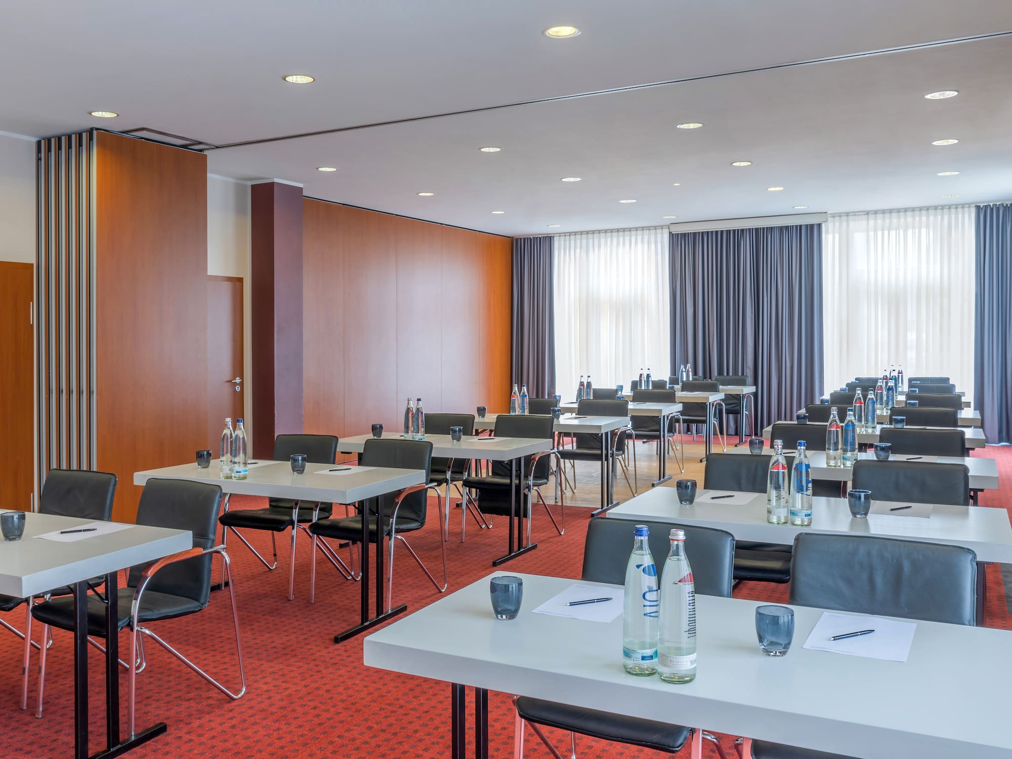 a room with tables and chairs