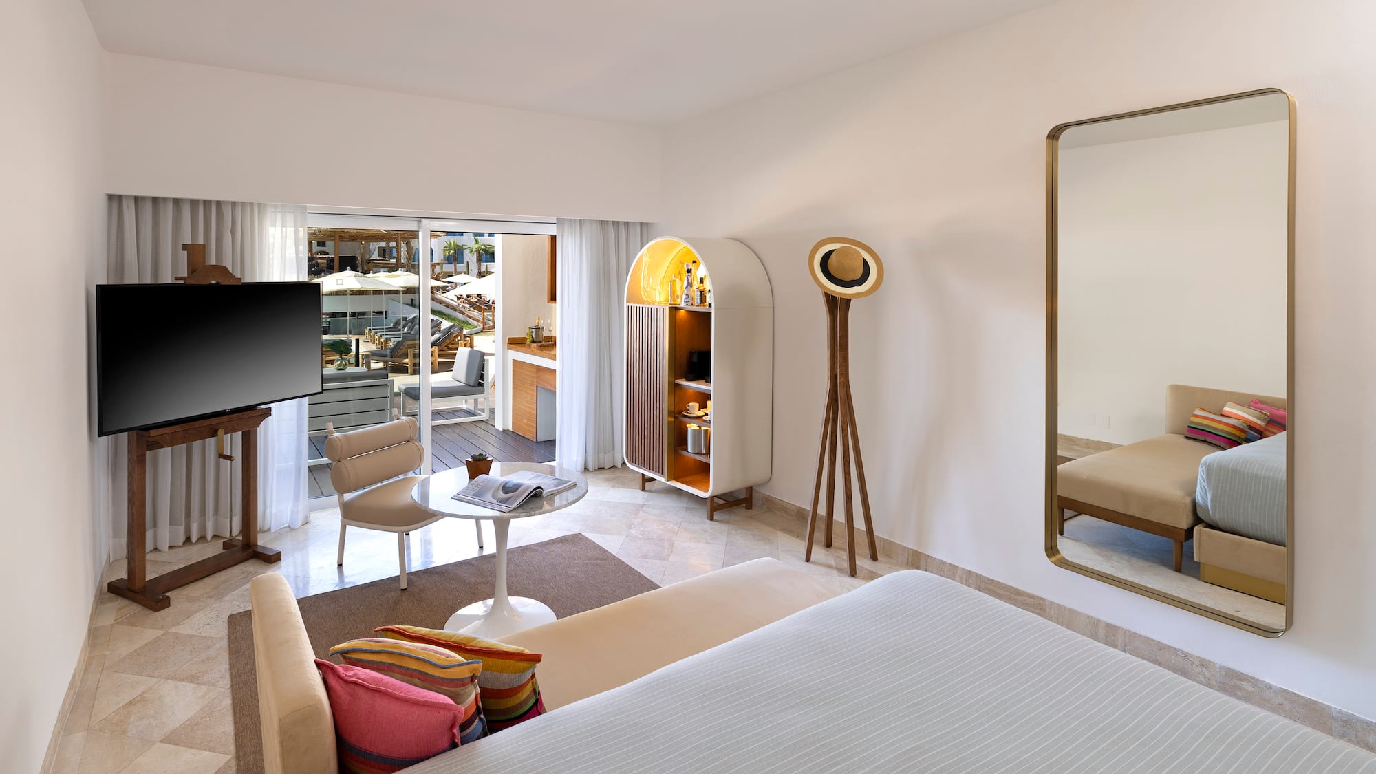 a room with a television and a bed