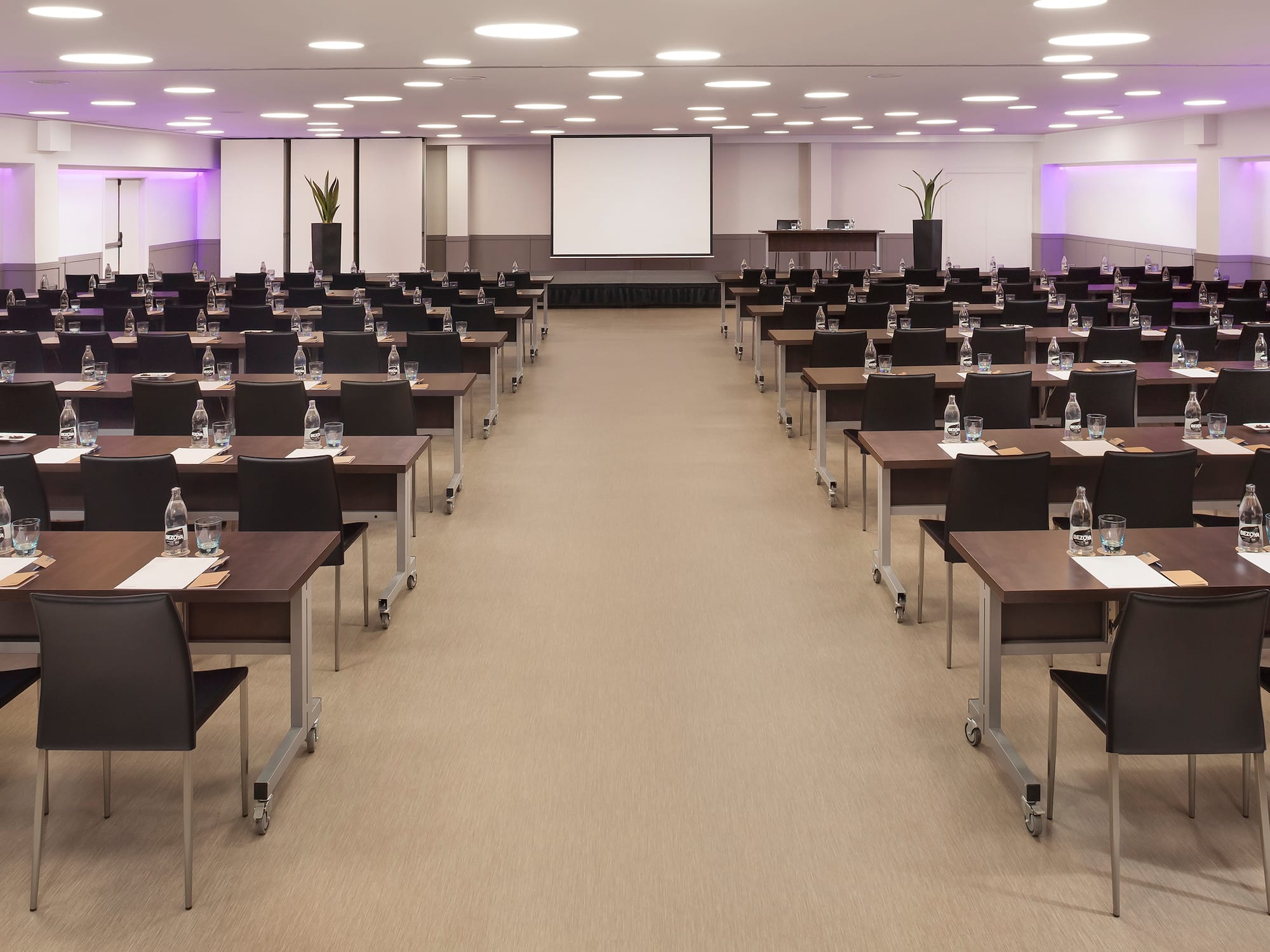 a room with tables and chairs
