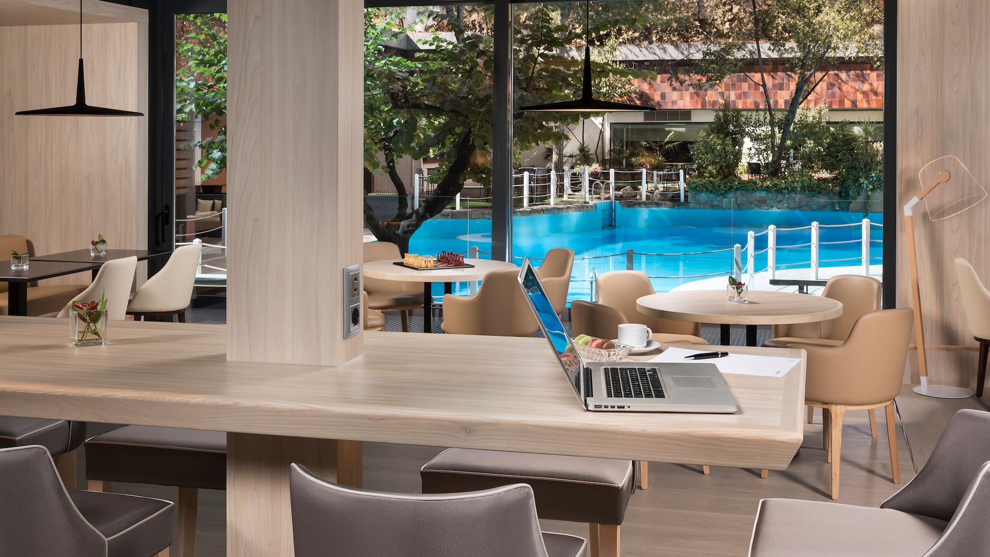 a laptop on a table in a restaurant