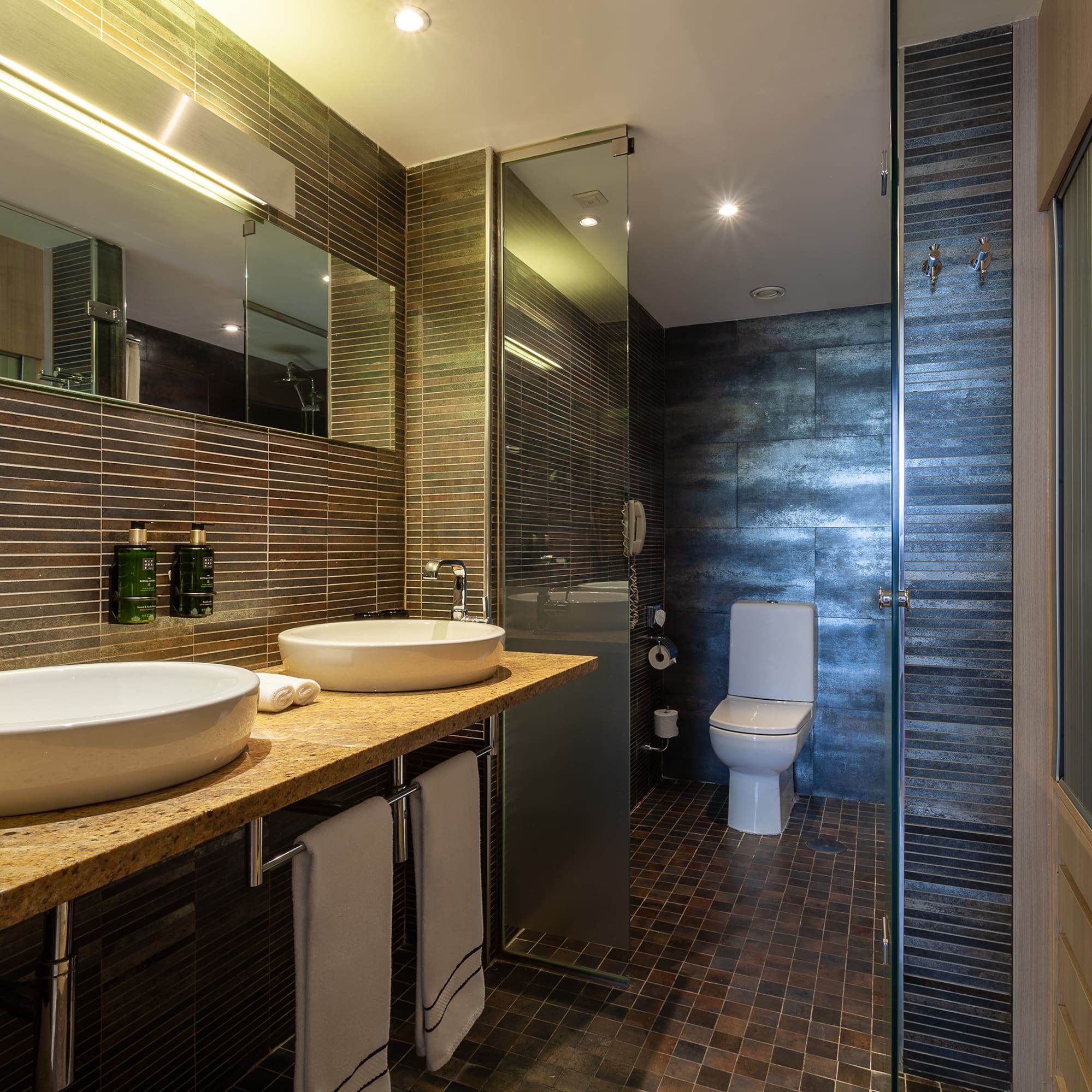 a bathroom with a sink and toilet