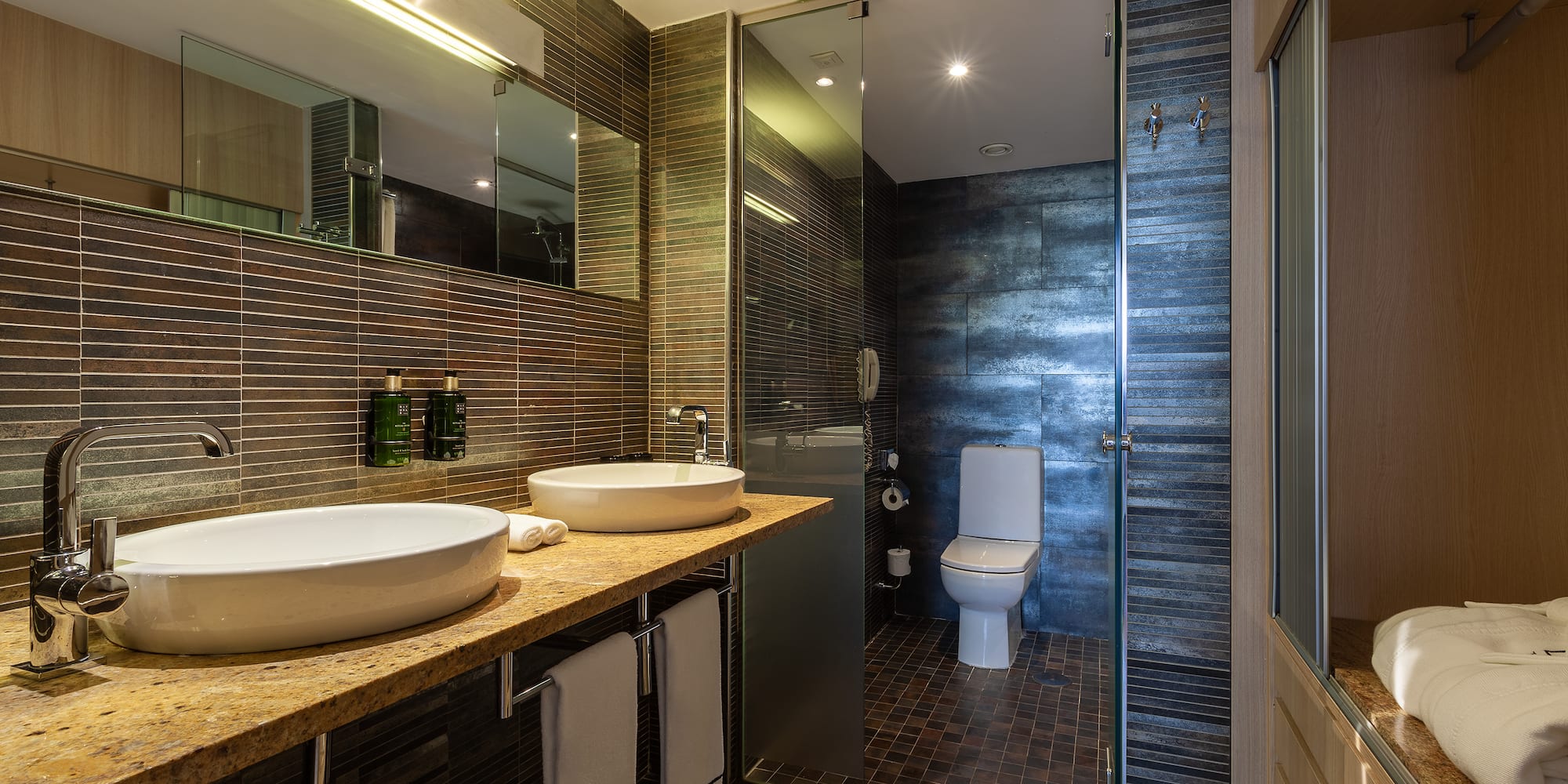 a bathroom with a sink and toilet