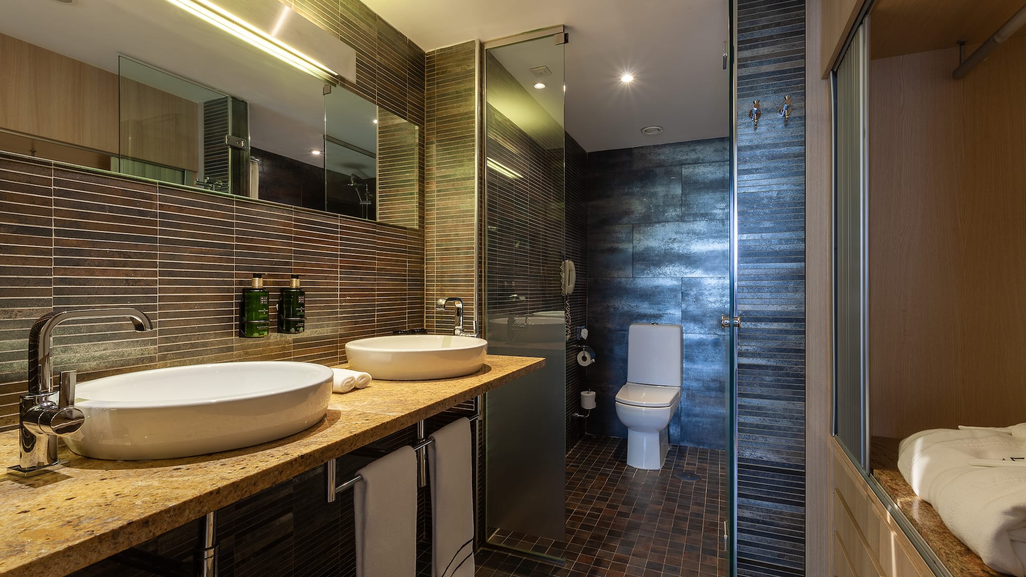 a bathroom with a sink and toilet