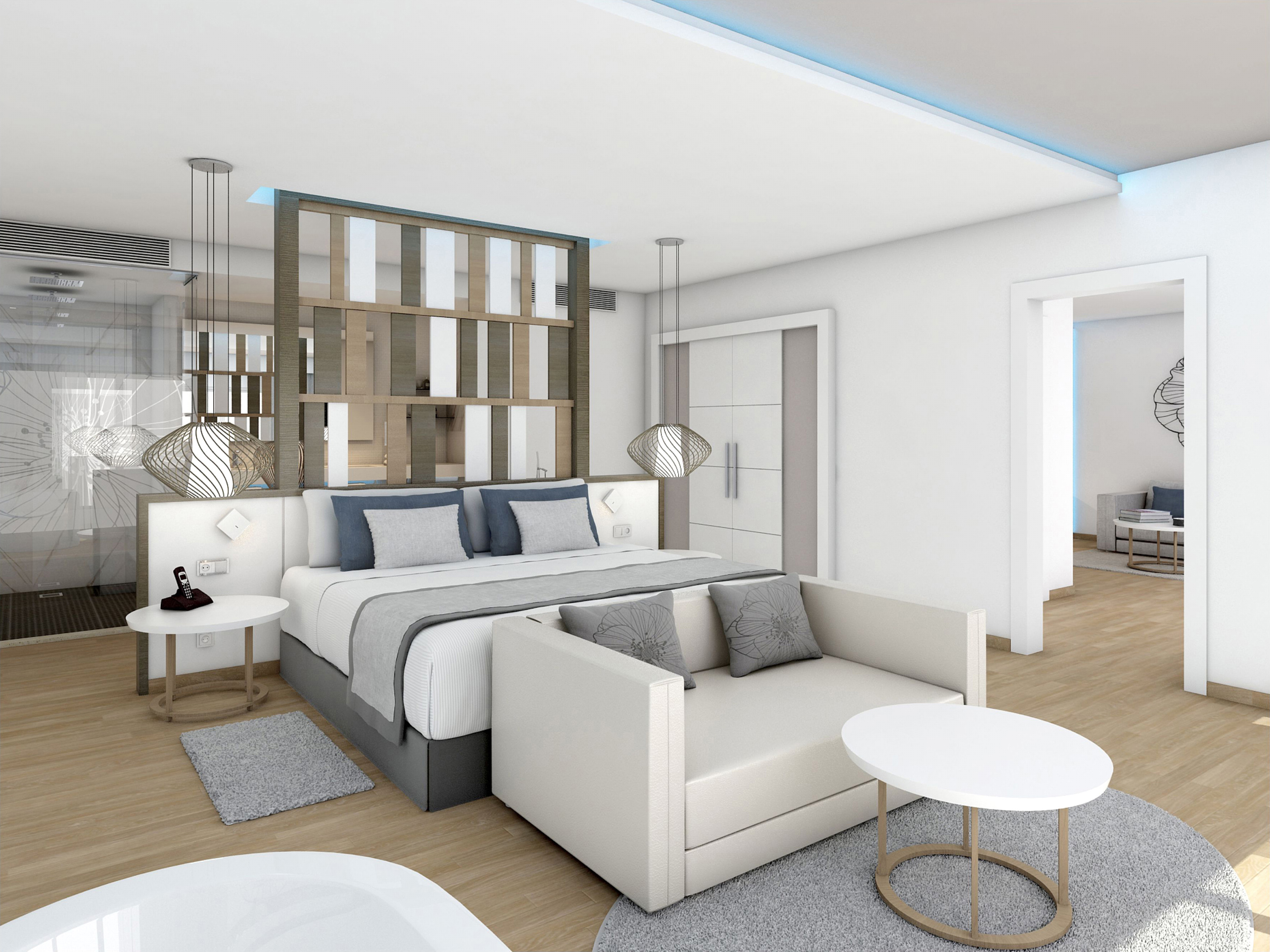 a bedroom with a bed and a couch