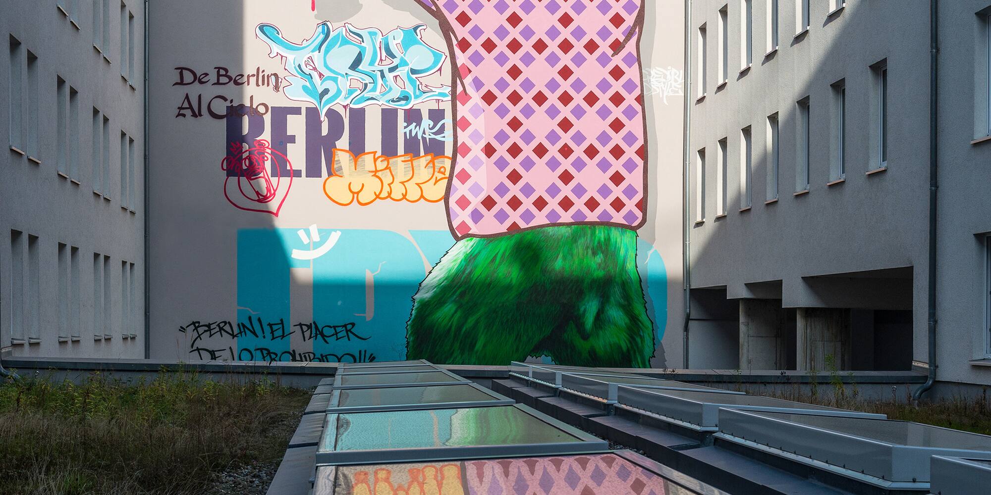 a large mural of a bear on a wall