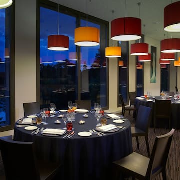 a round table with plates and glasses