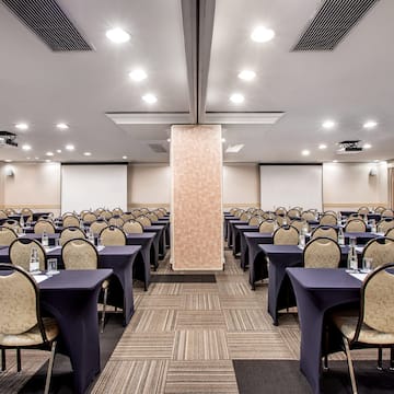 a room with tables and chairs